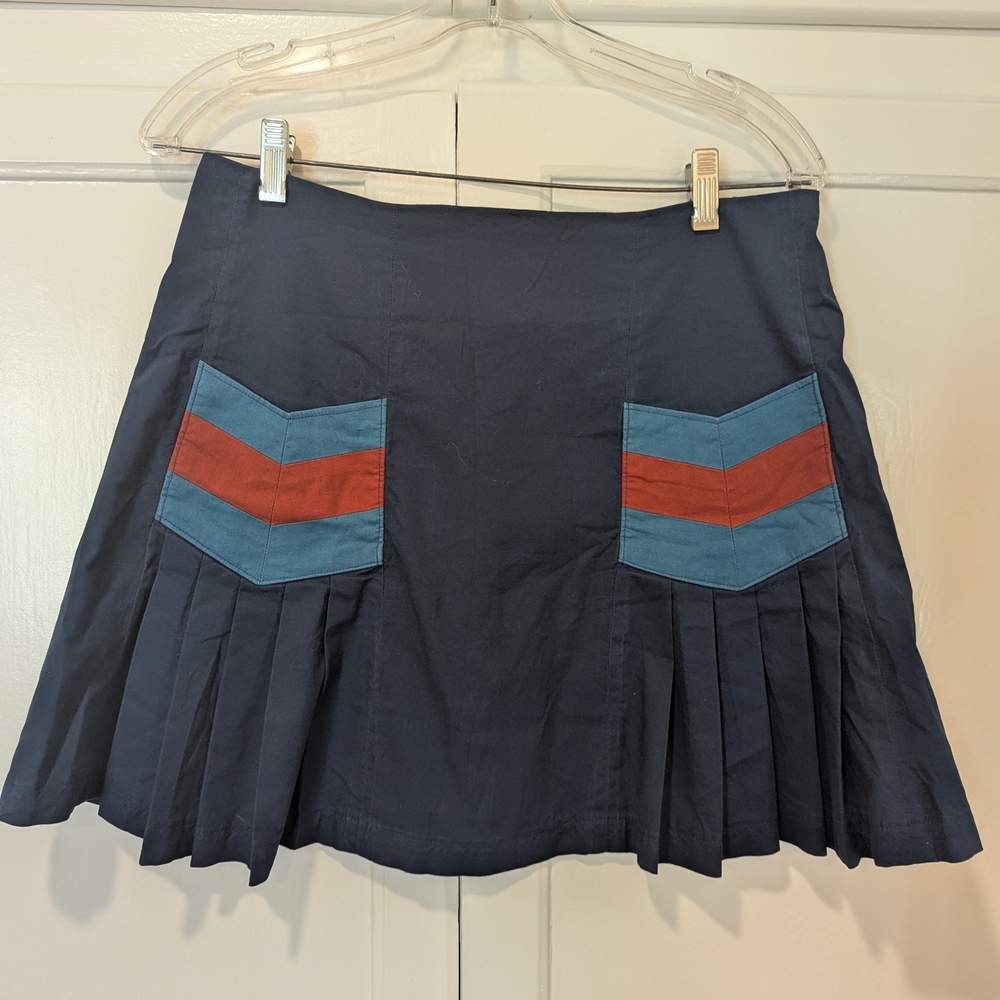 Navy Pleated Skirt With Teal And Orange Pockets